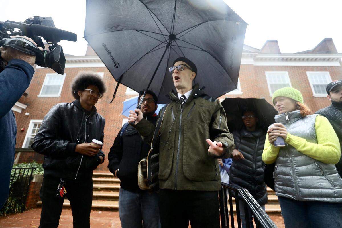 Dwayne Dixon walks into the Orange County courthouse on Thursday, Nov. 15, 2018, to face an allegation of simple assault in connection with a Silent Sam protest.