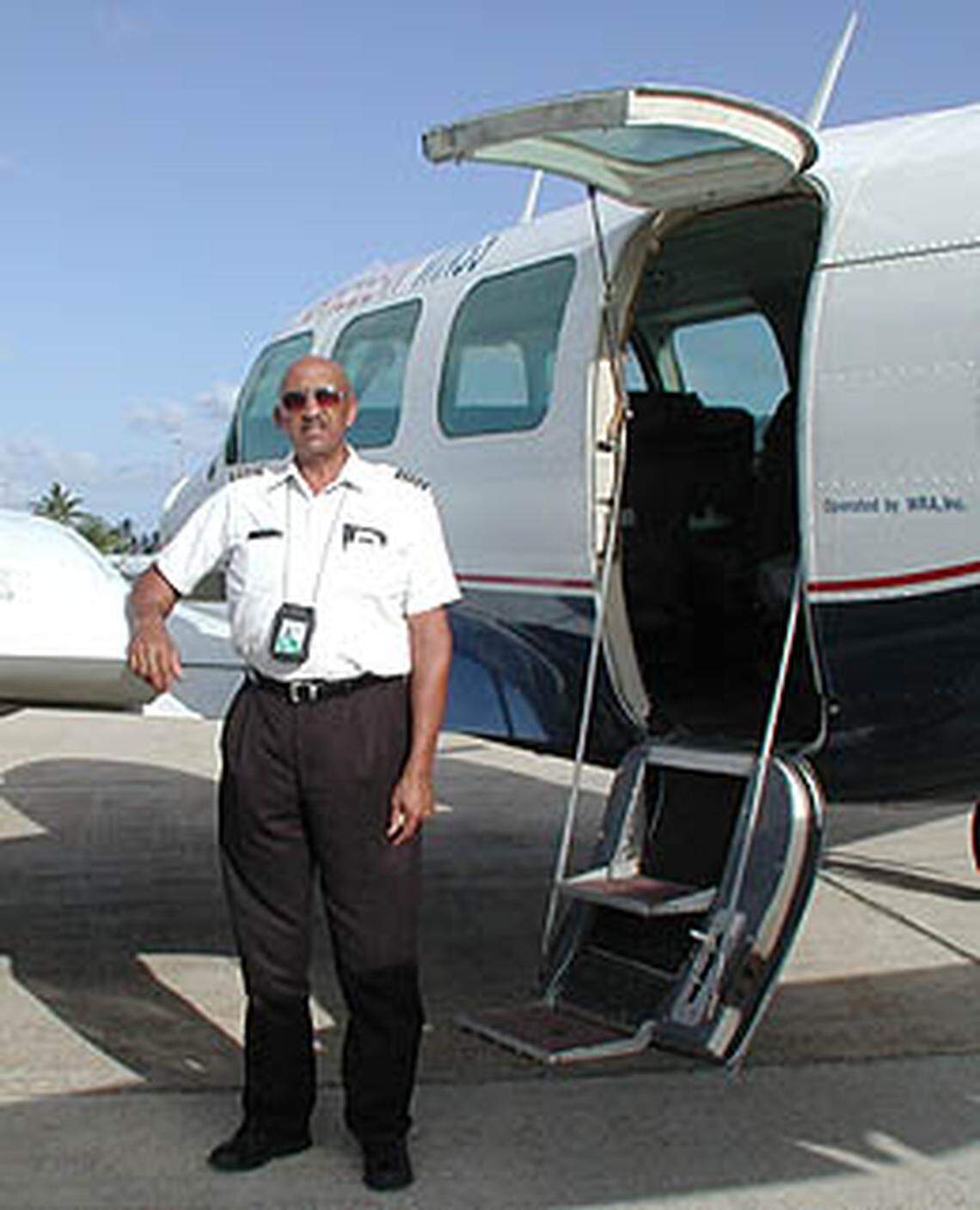 This photo, ca. 1980, is of Warren Wheeler during his active service with Wheeler Airlines. Wheeler started what became Wheeler Airlines in 1969 and it became the first African-American owned and operated air service in the United States. The airline closed in 1991. At its height in the mid-'80s, it carried some 40,000 passengers per year.