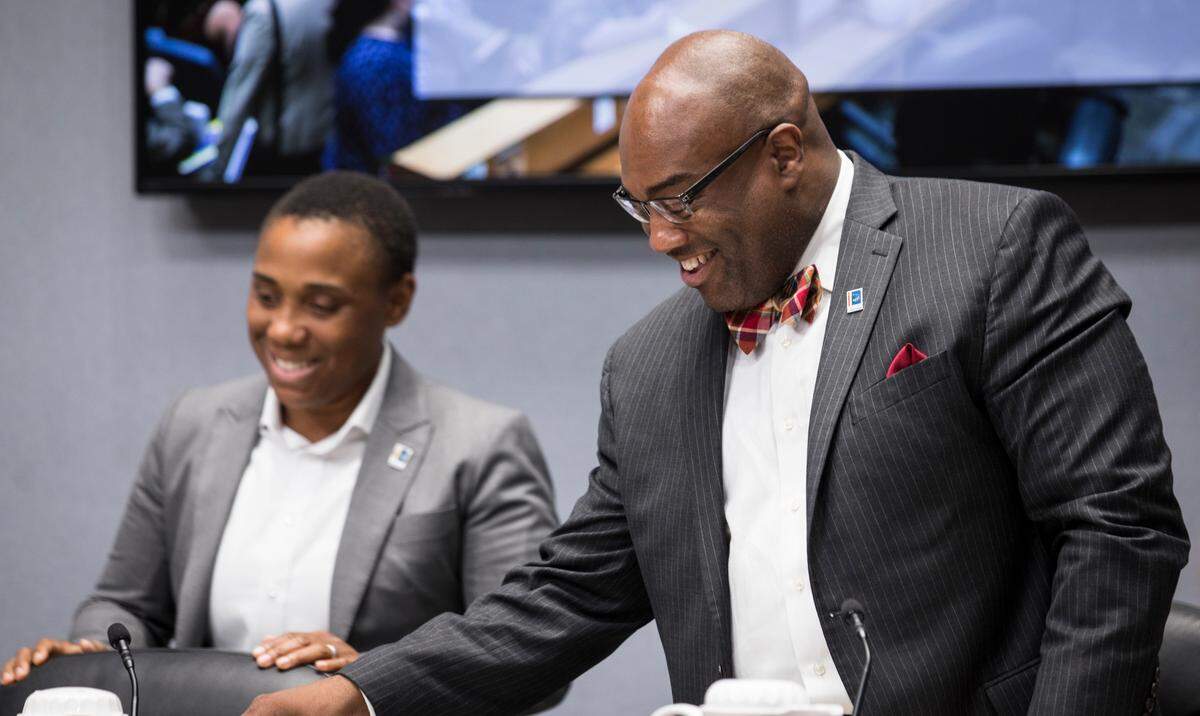 Durham Mayor Pro Tem Member Mark-Anthony Middleton, right, is pictured at a 2018 meeting alongside then City Council member Vernetta Alston. Middleton will not run for mayor in 2023, he has decided.
