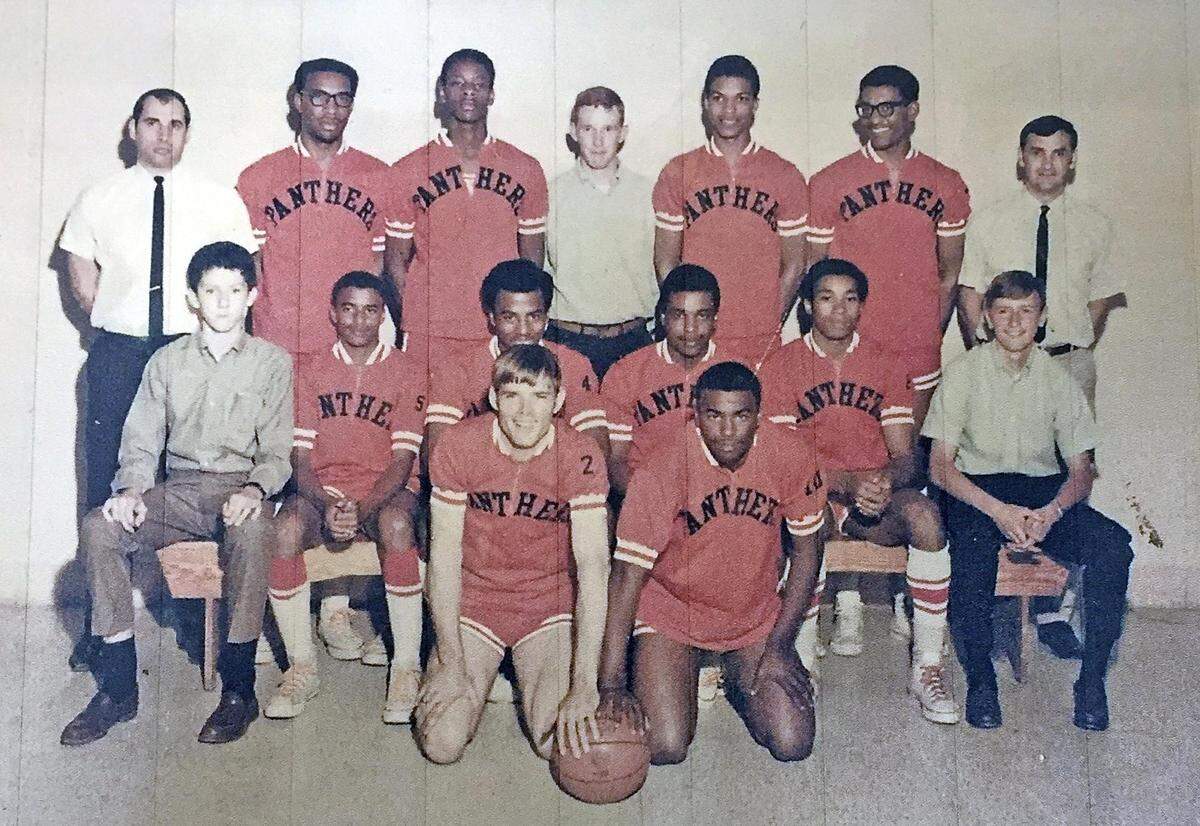 The 1969 Orange High School basketball team won the state championships the year after the formerly all-white school was integrated with all-black Central High School. Former students and teachers say the winning team played a vital role in unifying the school.