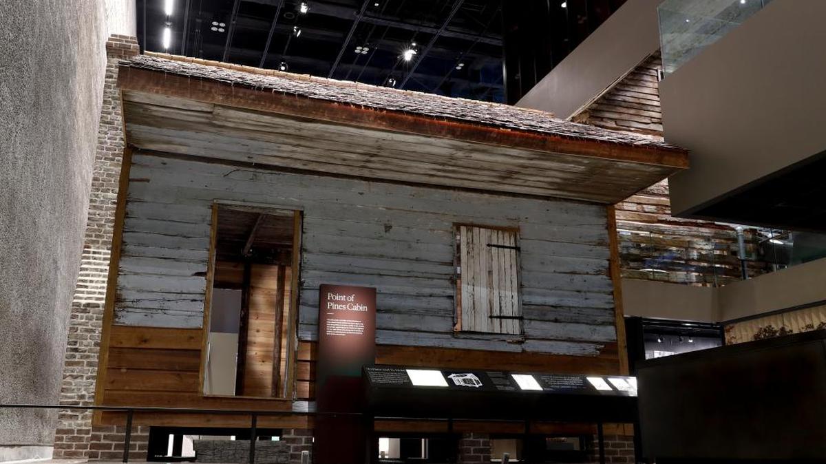 The front of a slave cabin from Edisto Island, S.C. on display at the National Museum of African American History in Washington, Tuesday, April 11, 2017. The two-room wood cabin dates to the 1850's and is prominently displayed in the history galleries of the museum. It is believed to be one of the oldest preserved slave cabins in the U.S.