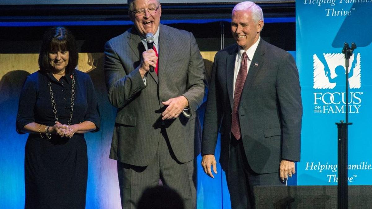 Focus on the Family President Jim Daly, center, jokes with Vice President Mike Pence and his wife, Karen, while introducing them at the organization’s 40th anniversary celebration Friday, June 23, during Pence’s visit to Colorado Springs, Colo.