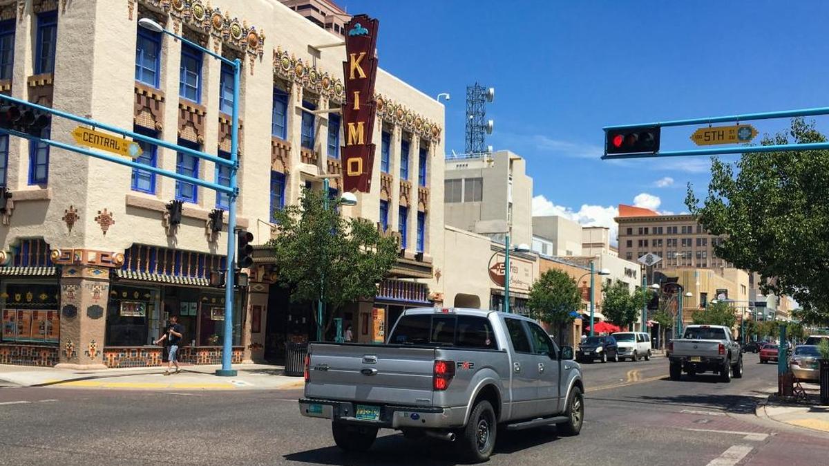This Aug. 1, 2016, file photo shows the Kimo Theater on Albuquerque's historic Route 66 in Albuquerque, N.M. Route 66, the historic American roadway that linked Chicago to the West Coast, soon may be dropped from a National Park Service preservation program. A federal law authorizing the Route 66 Corridor Preservation Program is set to expire in two years and with it would go millions of dollars in grants for reviving old tourist spots in struggling towns.