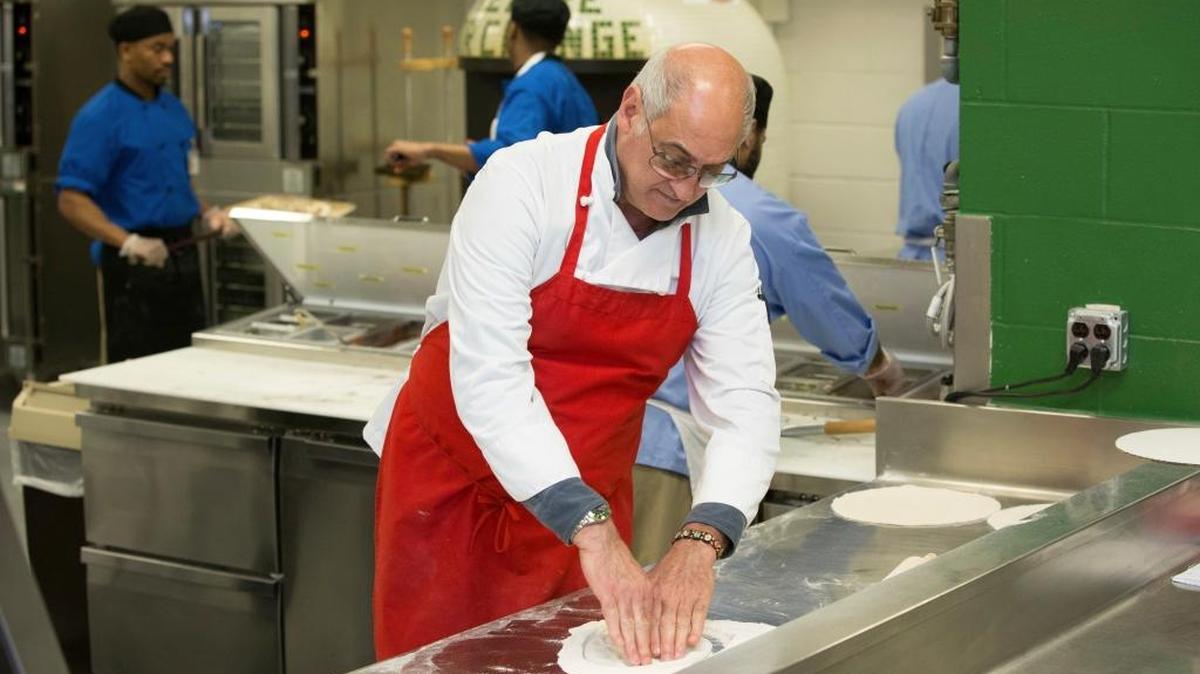 Bruno Abate, a chef/owner of a restaurant in Chicago, teaches inmates about cooking and nutrition at the Cook County Jail in Chicago. Inmates in the jail's medium-security Division 11 are now allowed to order pizzas made by inmates who are participating in the jail's "Recipe for Change" program while they wait for trial.