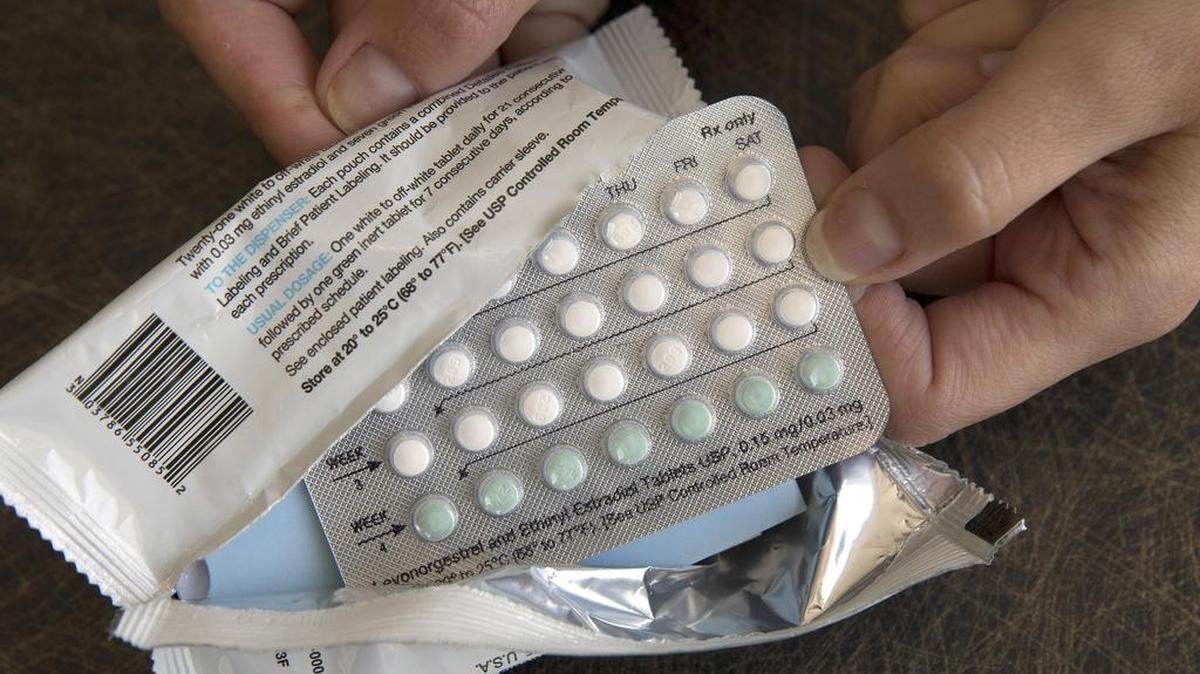In this Aug. 26, 2016, file photo, a one-month dosage of hormonal birth control pills is displayed in Sacramento, Calif.