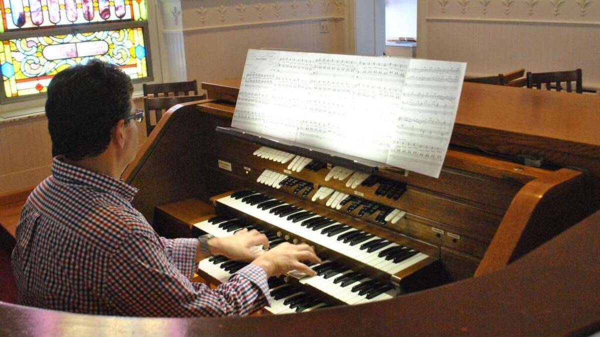 Mike Capone plays the pipe organ at First Presbyterian Church in Stroudsburg, Pa. The church has a unique project in the works. It will combine two church organs into one over the next two years, thanks to the generous gifting of an Easton, Pa. organ no longer in use.