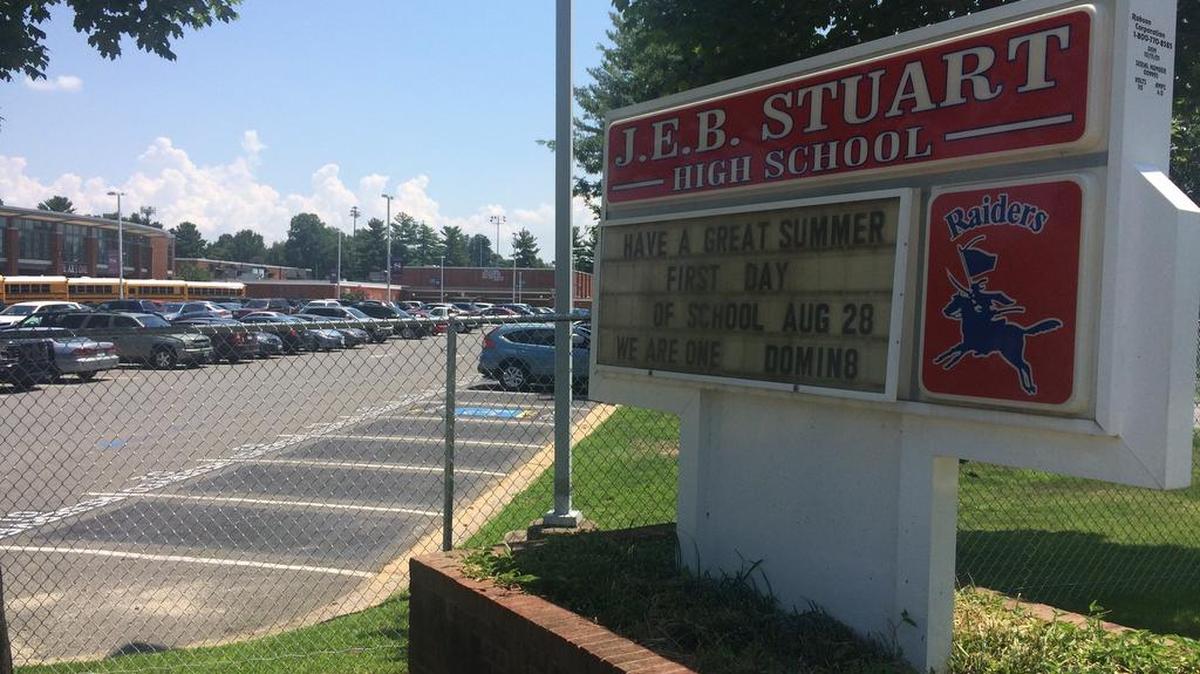 This July 20 file photo shows the sign for J.E.B. Stuart High School in Falls Church, Va., named after the slaveholding Confederate general who was mortally wounded in an 1864 battle. With a new school year dawning, education officials around the nation are grappling with whether to remove the names, images and statues of Confederate figures from public schools, some of which are now filled with students of color who could be descendants of those whom the South fought to keep in slavery.