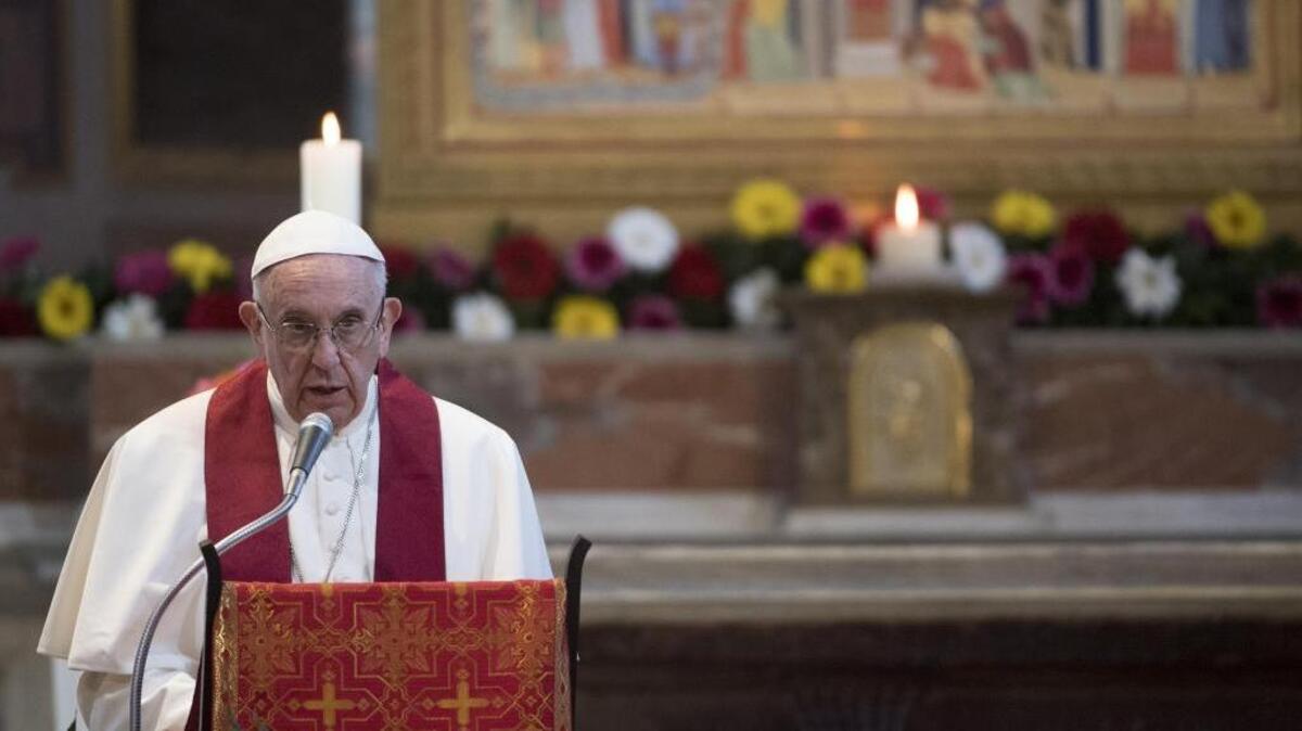 Pope Francis speaks in the Basilica of St. Bartholomew in Rome Saturday as he celebrates the Liturgy of the Word in memory of the martyrs of the 20th and 21st centuries.