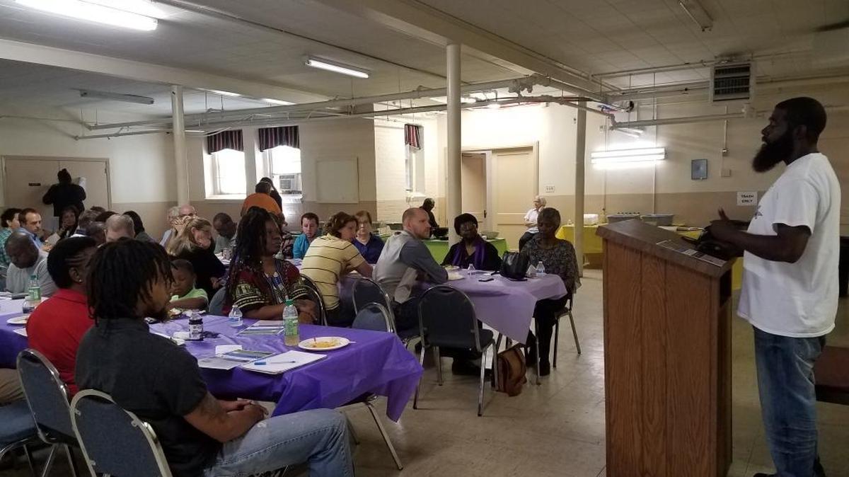 Dorel Clayton of Bull City United speaks to the Religious Coalition for a Nonviolent Durham.