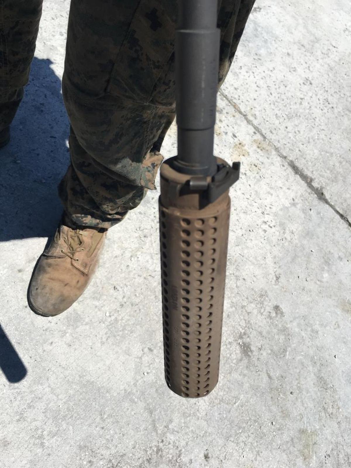 A suppressor on a Camp Lejeune Marine’s M4 carbine.