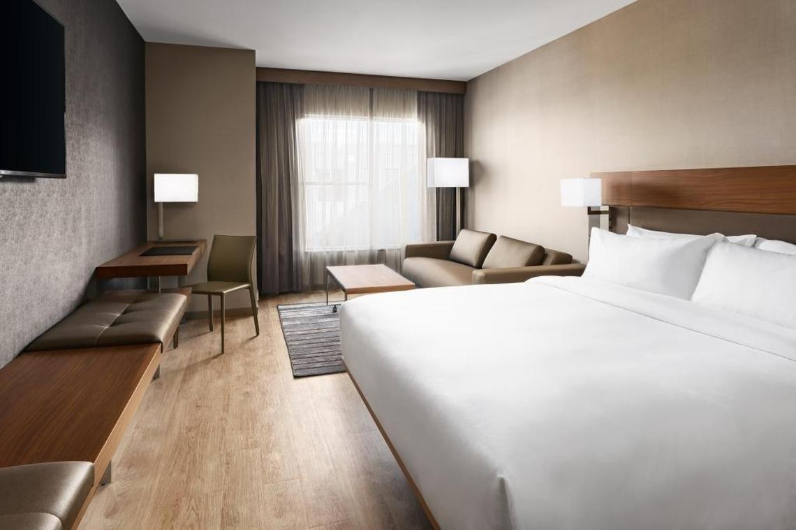 An example of the minimalist rooms inside of the AC Hotel. The 123-room hotel celebrated its grand opening this week.