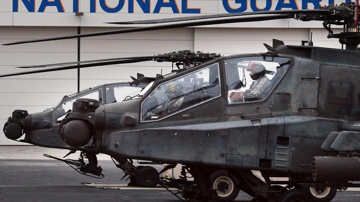 National Guardsmen are among those workers who rely on North Carolina’s state pension fund. Here AH- 64D Apache Longbow helicopters sit on the tarmac at the NC Army National Guard facility in Morrisville.
