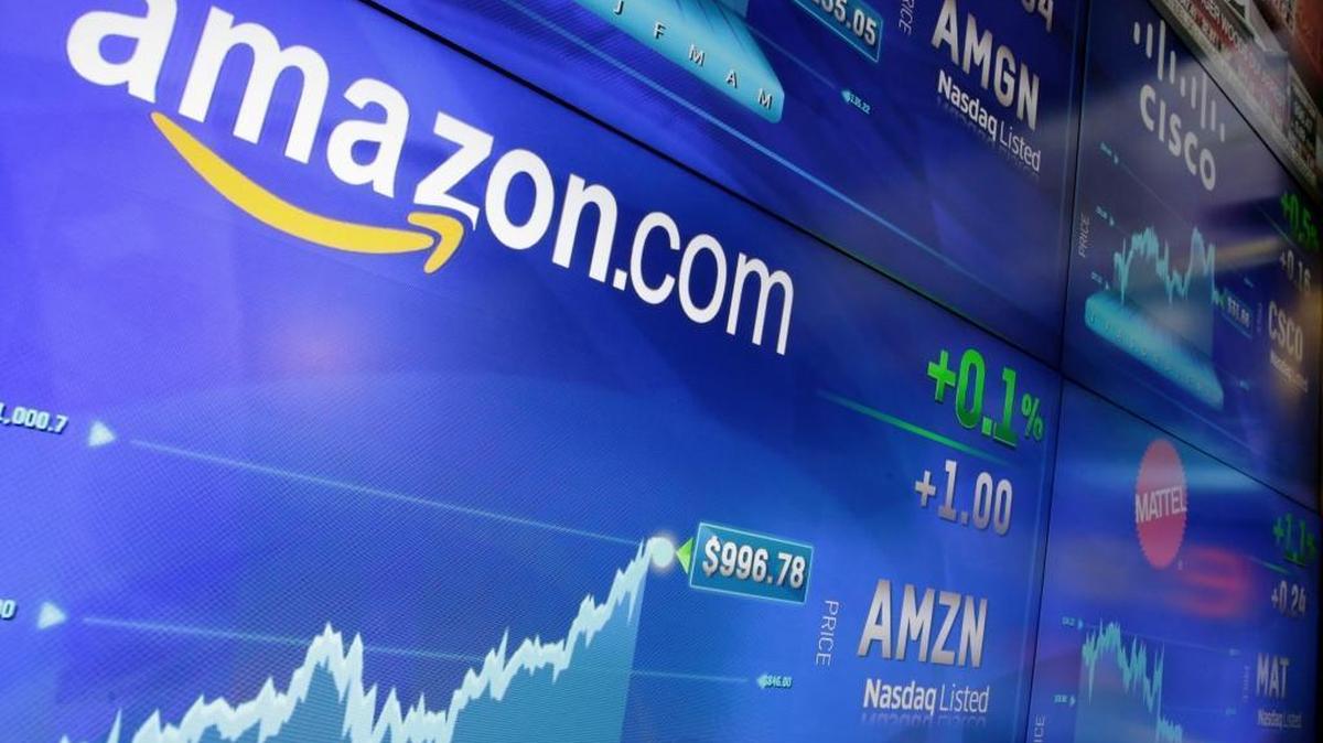 In this May 30 file photo, the Amazon logo is displayed at the Nasdaq MarketSite in New York’s Times Square.