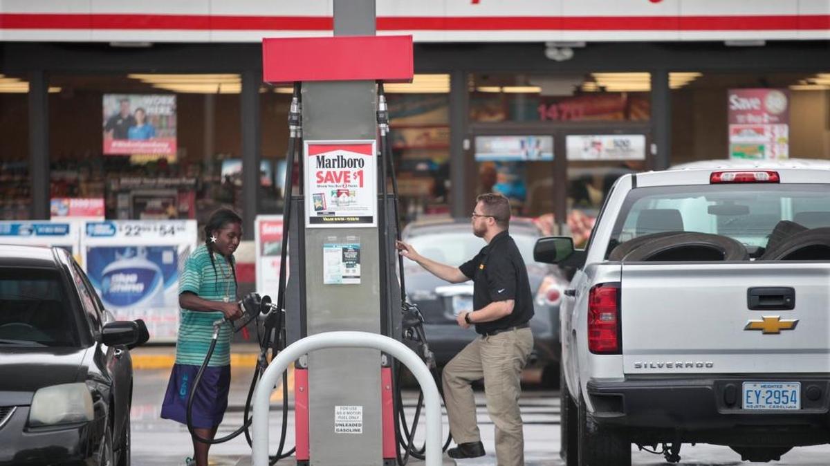 Motorists fuel up at the Speedway convenience store on U.S. 70 in Garner in this file photo from September 2016. After spiking in the aftermath of Hurricane Harvey, gas prices in North Carolina have begun to fall but remain more than 35 cents per gallon higher on average than before the storm.