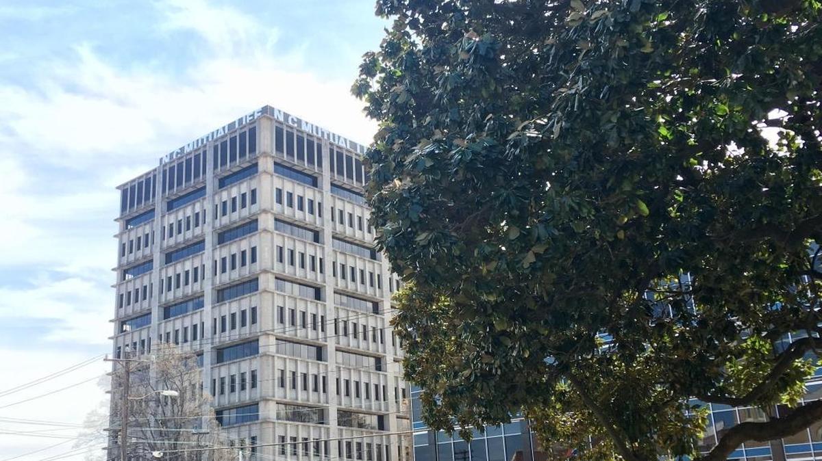 The NC Mutual building on West Chapel Hill Street will soon see changes to its facade as the group decreases its footprint there to one floor.