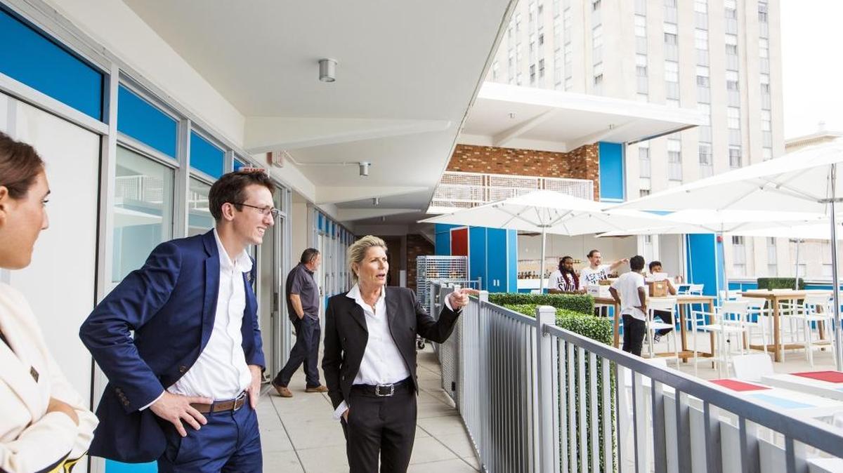 Jane Hills, right, developer of the new Unscripted Durham hotel, checks on employees preparing for the grand opening last July. The Unscripted is one of several new hotels in downtown Durham and will be present at the hospitality job fair being held at the Durham Convention Center on Wednesday, Feb. 28.