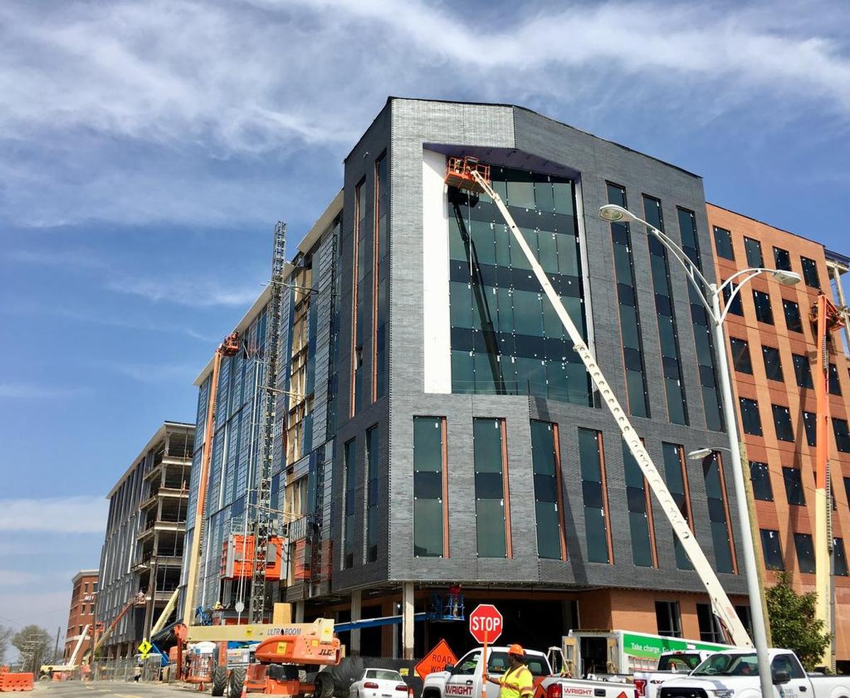 The two Durham Innovation District buildings, shown under construction on Morris Street in downtown, are scheduled to be completed this summer.