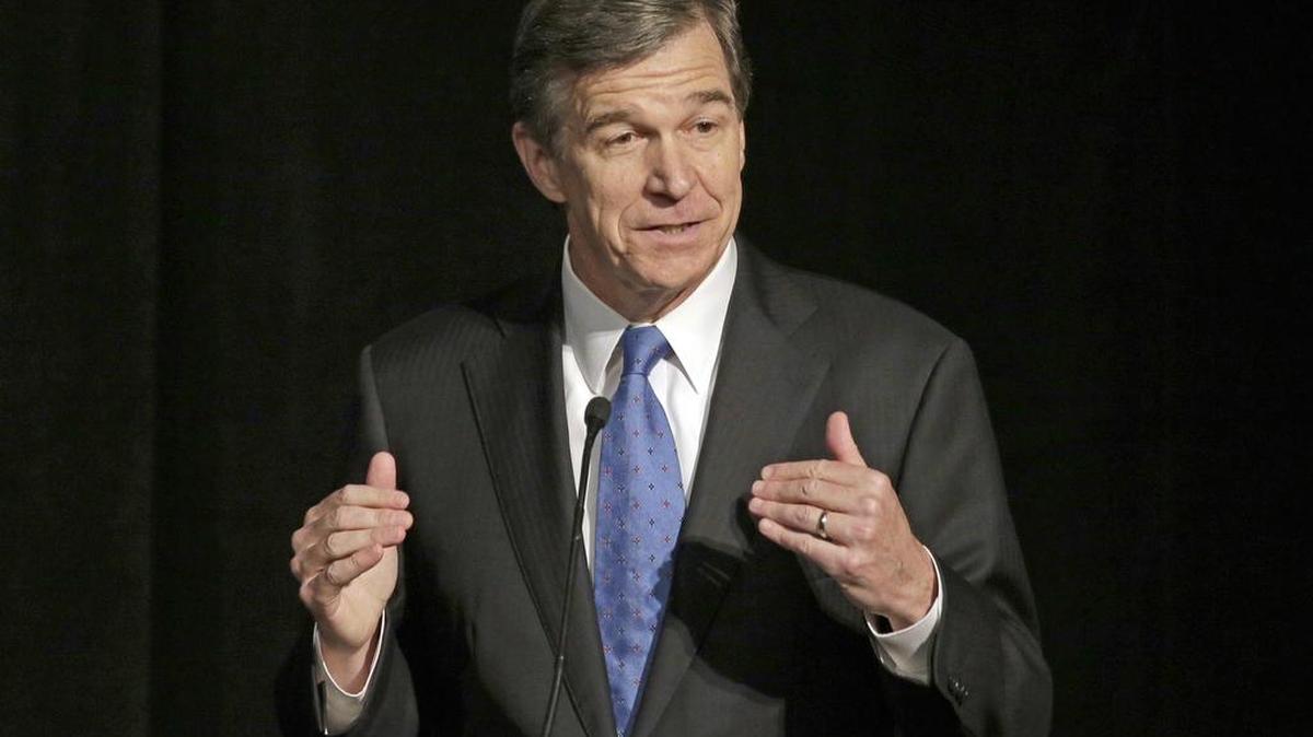In this June 24, 2016, file photo, Roy Cooper speaks during a forum in Charlotte.