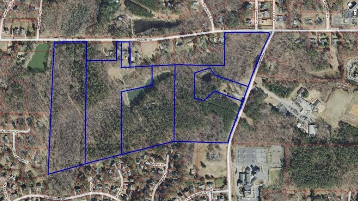 Stanley Martin, a Virginia homebuilder, plans to build more than 100 homes on the southwest corner of Pickett and Garrett roads in Durham. The purchased property is outlined in blue.