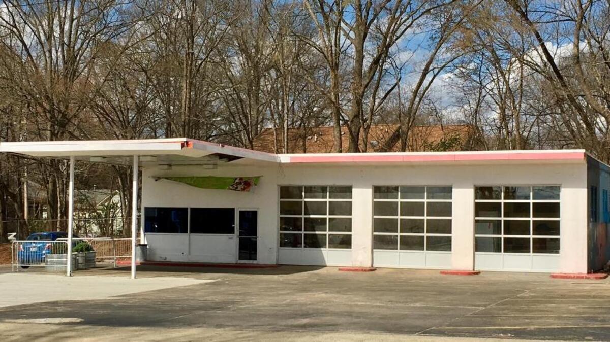 The former Gulf service station is being renovated into a space that will be used by Local Yogurt and Joe Van Gogh.