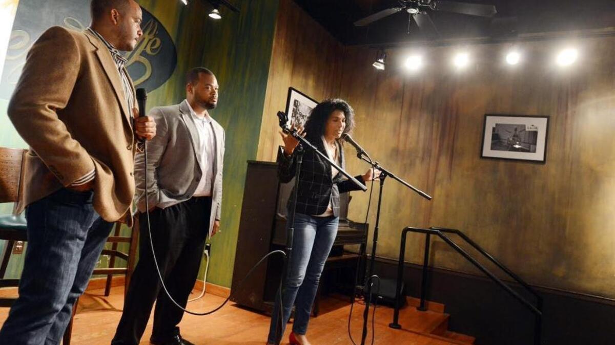 Co-founders of Black Wall Street, from left to right, Talib Graves-Manns, Tobias Rose and Jesica Averhart, speak at the Black Wall Street Homecoming in 2015.