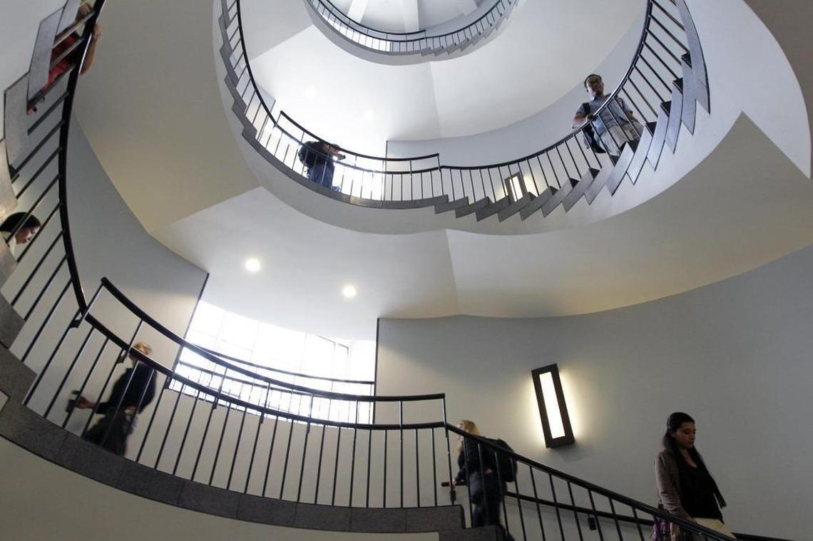 Students shuffle between classes on the circular stairway inside the McColl Building in the UNC Kenan-Flagler School of Business complex on the UNC campus in Chapel Hill on Sept. 25, 2012. Amazon was the No. 1 recruiter of UNC’s MBA students last year.