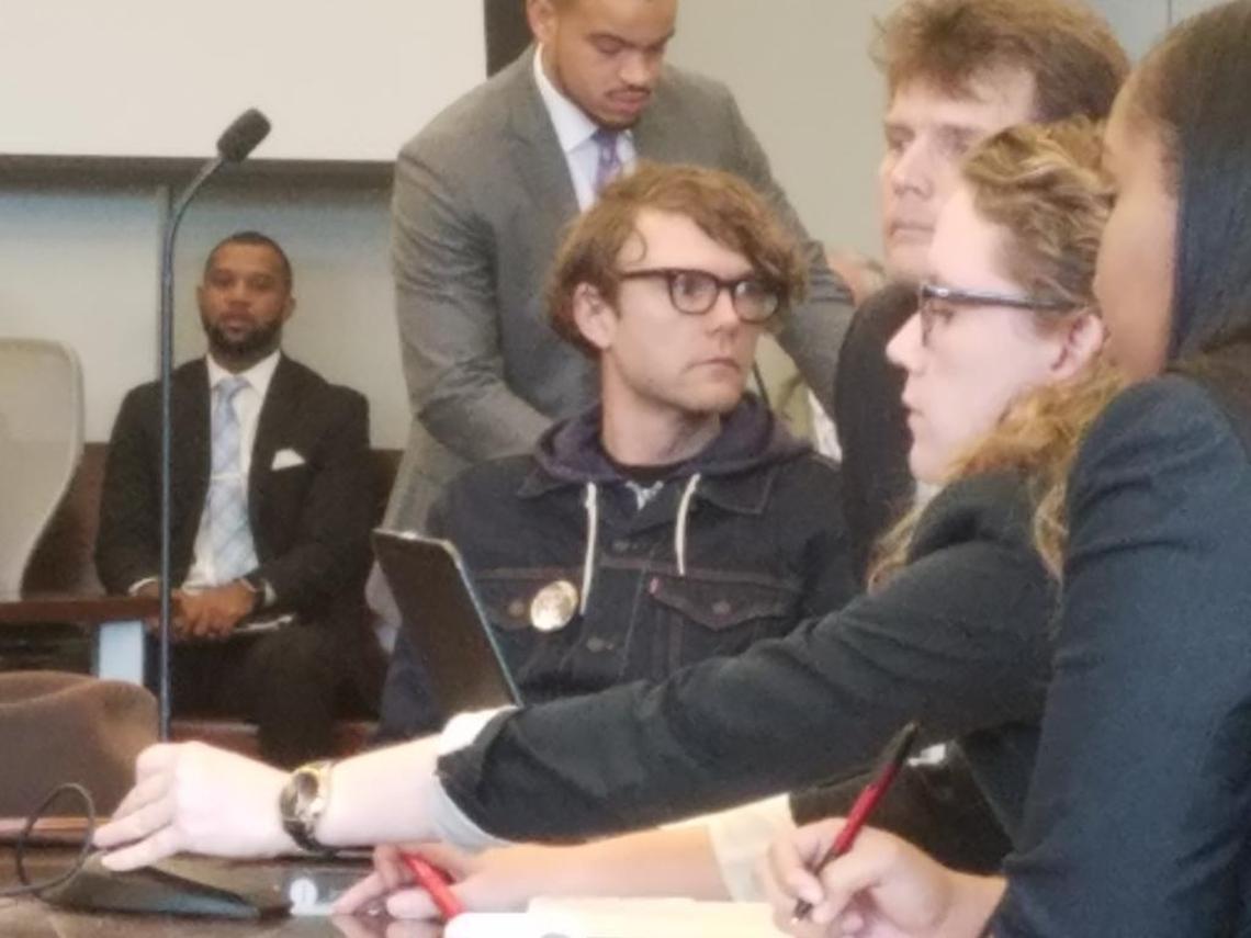 A judge dismissed the charges against Dante Strobino, in the glasses, the first of eight defendants to be tried Monday in the toppling of a Confederate monument in Durham last summer.