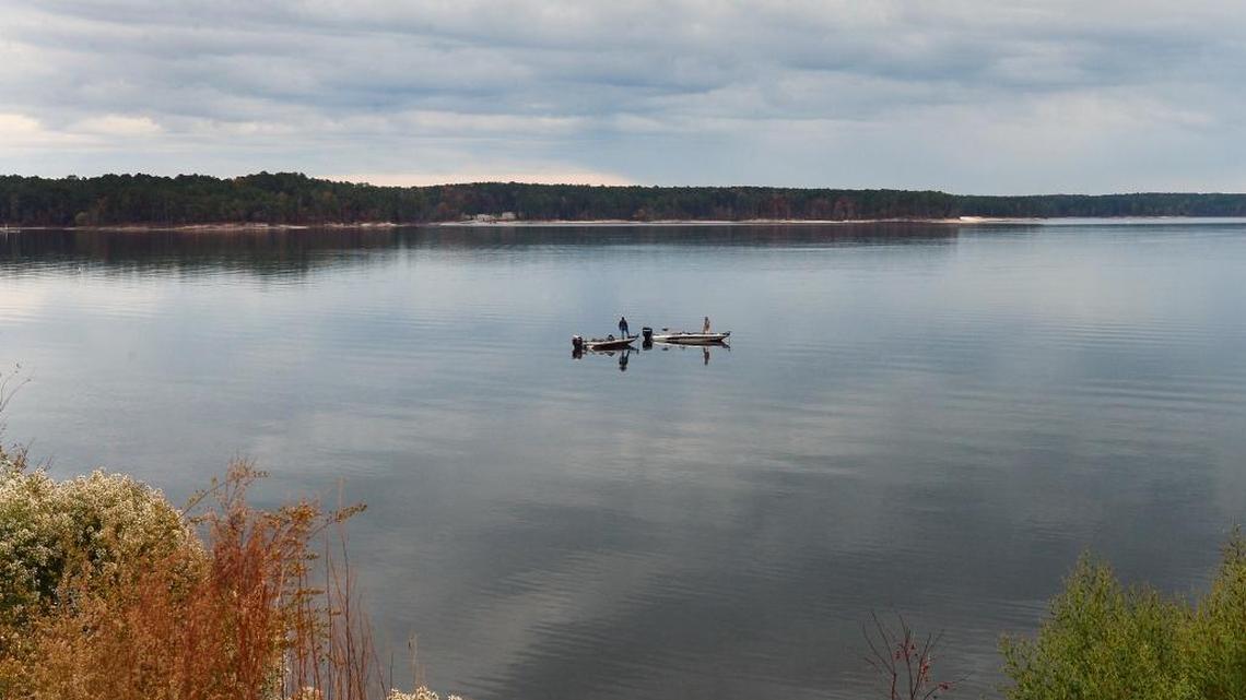 Two fishermen chat with each other near the Seaforth boat launch on Jordan Lake Friday Nov.15, 2013.