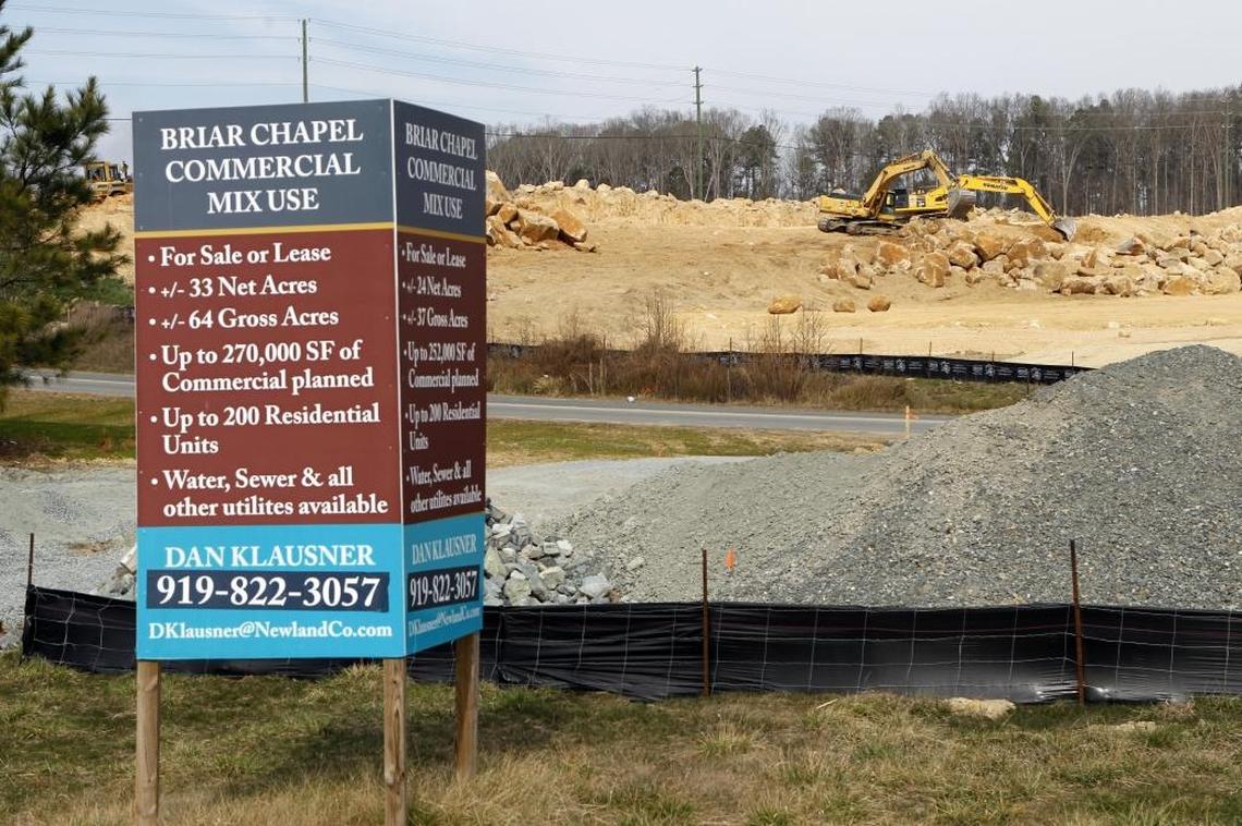 Heavy equipment moves large boulders as another portion of the Briar Chapel development is built on U.S. 15-501 in northeastern Chatham County. The 30-acre commercial phase will add more retail, restaurants, offices and a Central Carolina Community College Health Sciences building.