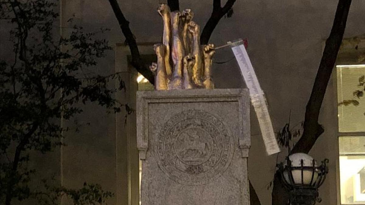 A piece of art is shown early Friday on the base on which the Durham County Confererate statue used to stand downtown in front of the Durham County administrative building. The original statue was pulled down by demonstrators on Aug. 14. The new artwork was put on the statue’s base by someone anonymously at around 3 a.m. Friday.