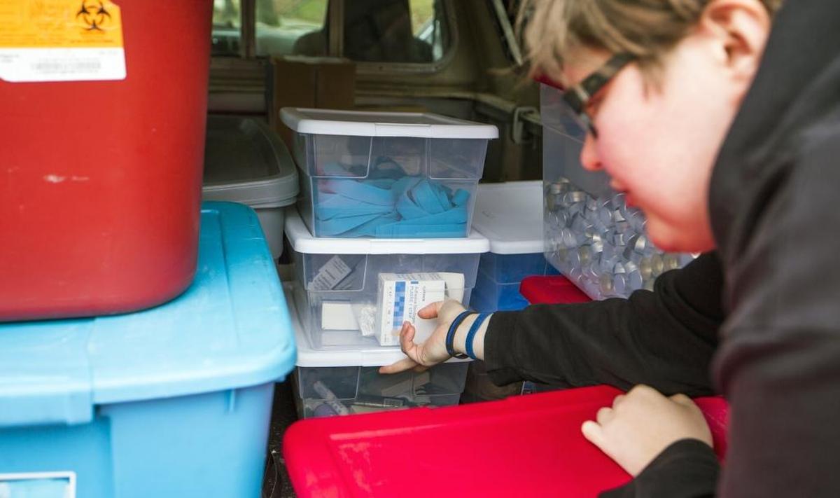 Loftin Wilson, program coordinator with the North Carolina Harm Reduction Coalition, shows the materials organized in the bed of the truck that he uses to operate a mobile syringe exchange program, also delivering clean supplies and naloxone kits, two days a week in Durham, NC, on Wednesday, Dec. 6, 2017.