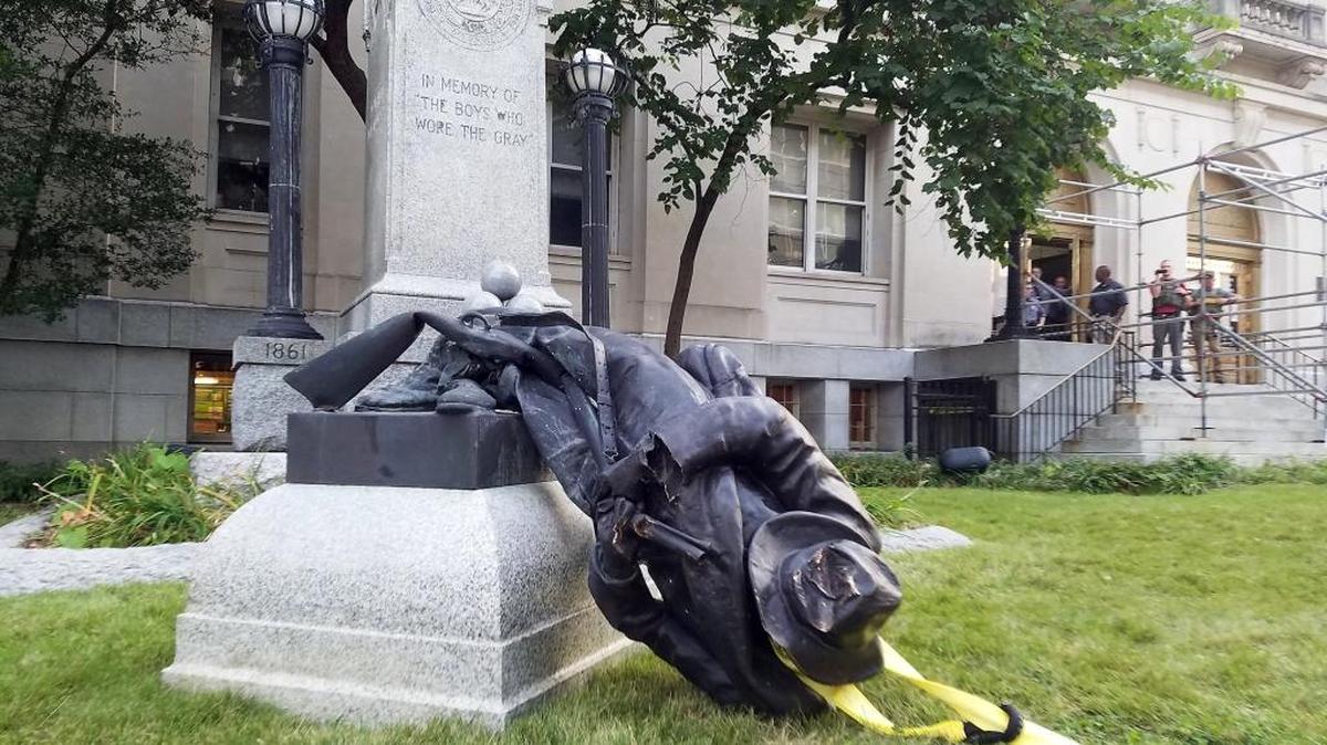 The Confederate statue in front of the old Durham County courthouse was toppled by protesters on Aug. 14, 2017. Its remains are now in a county warehouse. People’s Alliance, which endorsed all five county commissioners, wants them to value it at zero dollars.