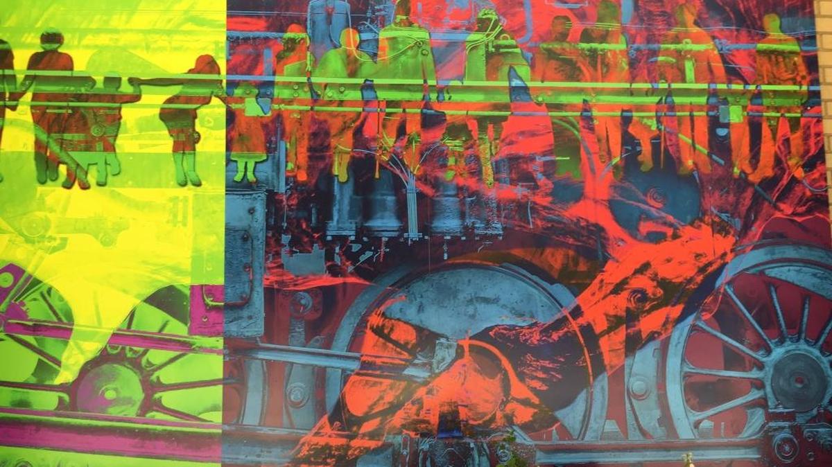 This is a detail from Frank Kreacic’s 3-D painting “Durham — Charging into the 21st Century,” on view at City Hall Plaza.