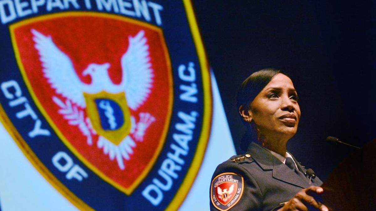 Cerelyn "C.J." Davis addresses the crowd after her swearing-in ceremony as Chief of Police of the city of Durham police department, at the Carolina Theatre.