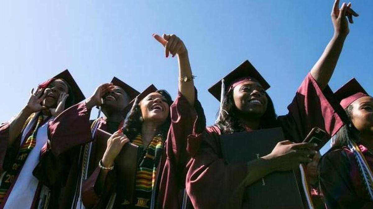 Graduates celebrate as their friends names are called during N.C. Central University’s 2016 commencement.