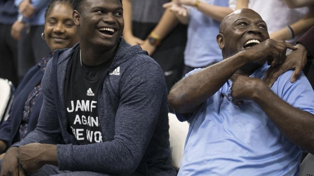 North Carolina recruiting target Zion Williamson, left, sits beside former Tar Heels great Phil Ford prior to the Tar Heels’ exhibition game against Barton College on Friday, October 27, 2017 at the Smith Center in Chapel Hill, N.C.