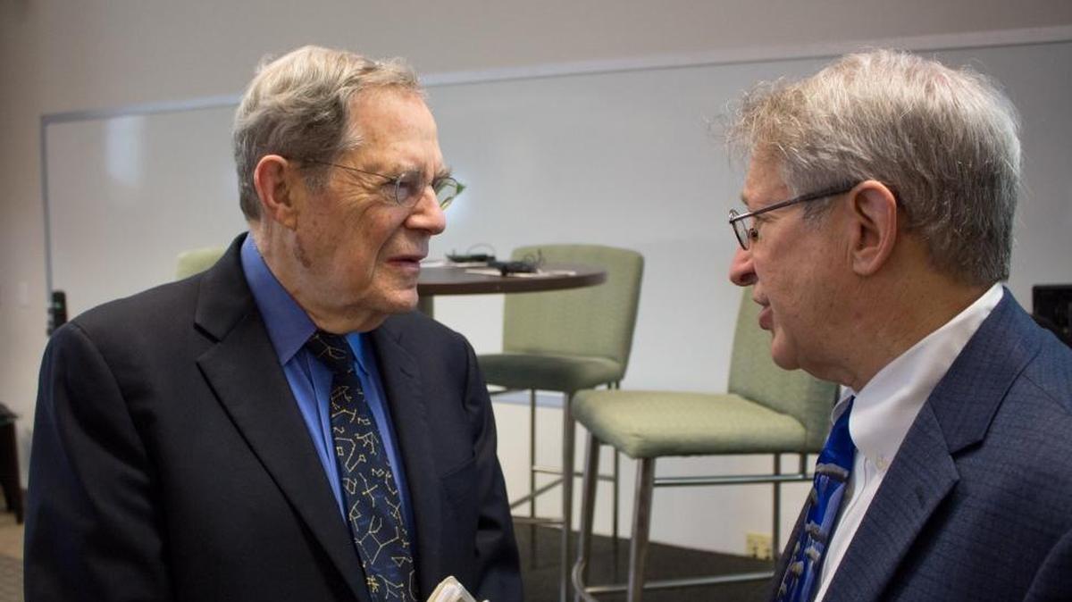 Georgetown University Law professor Peter Edelman speaks with Durham Mayor Steve Schewel before a talk about decriminalizing poverty Friday, Feb. 16, 2018, in Durham, N.C.