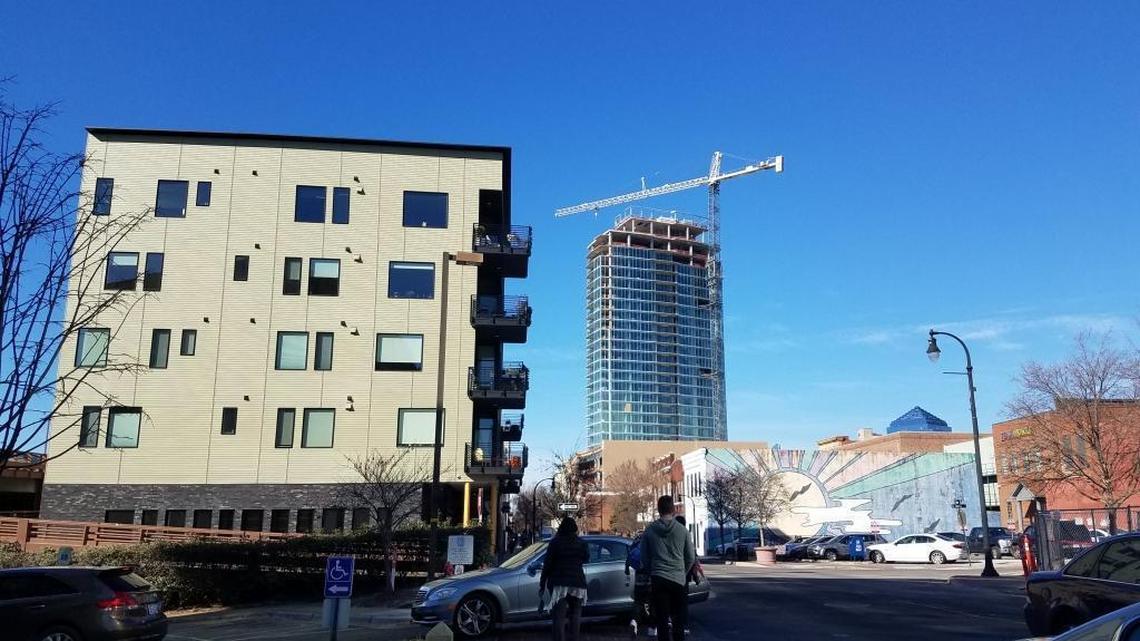 Durham leaders may make helping renters avoid evictions part of their affordable-housing strategy. Pictured are downtown apartments, left, and construction of One City Center in the distance on East Main Street in downtown Durham on Jan. 9, 2018.