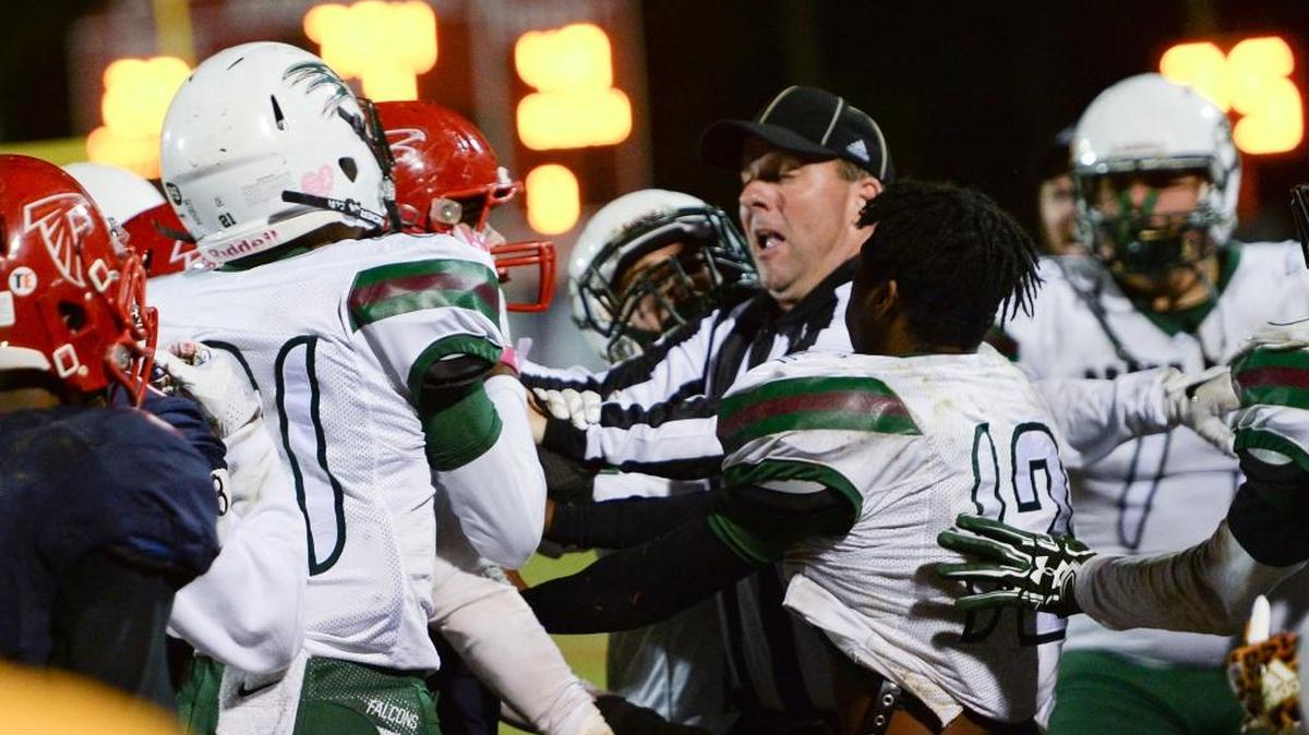 Game official separate players from Green Hope and Jordan. The game was stopped with about eight minutes left in the fourth quarter. The Green Hope Falcons visited the Jordan Falcons in a high school football game on Oct. 27, 2017. Green Hope won 48-20.