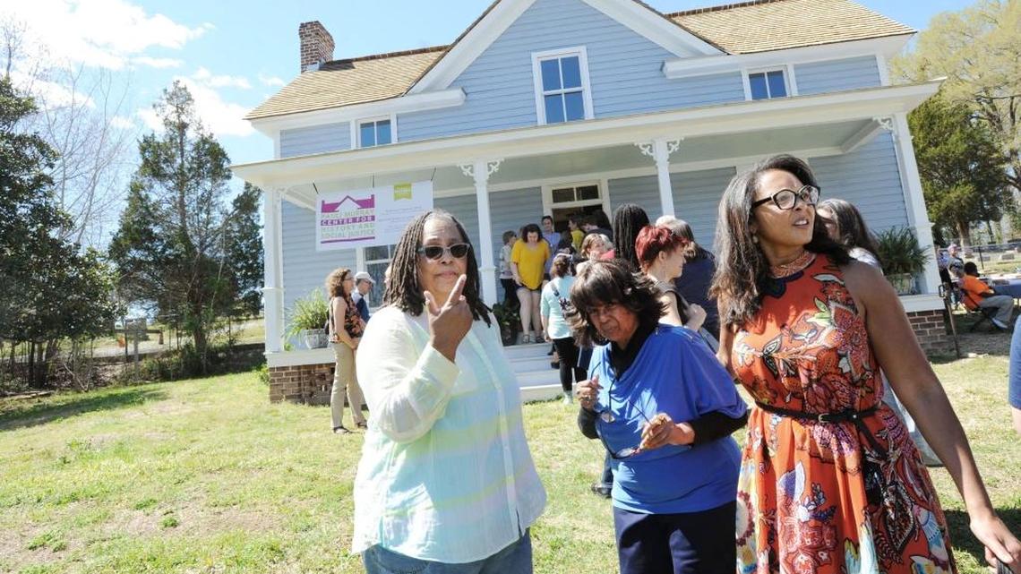 Pictured, from left, Stephanie Davis of the Fitzgerald family and Rosita Stevens-Holsey and Ria Aiken of the Pauli Murray family take part in Saturday’s celebration of Pauli Murray’s home’s designation as a National Historic Landmark.