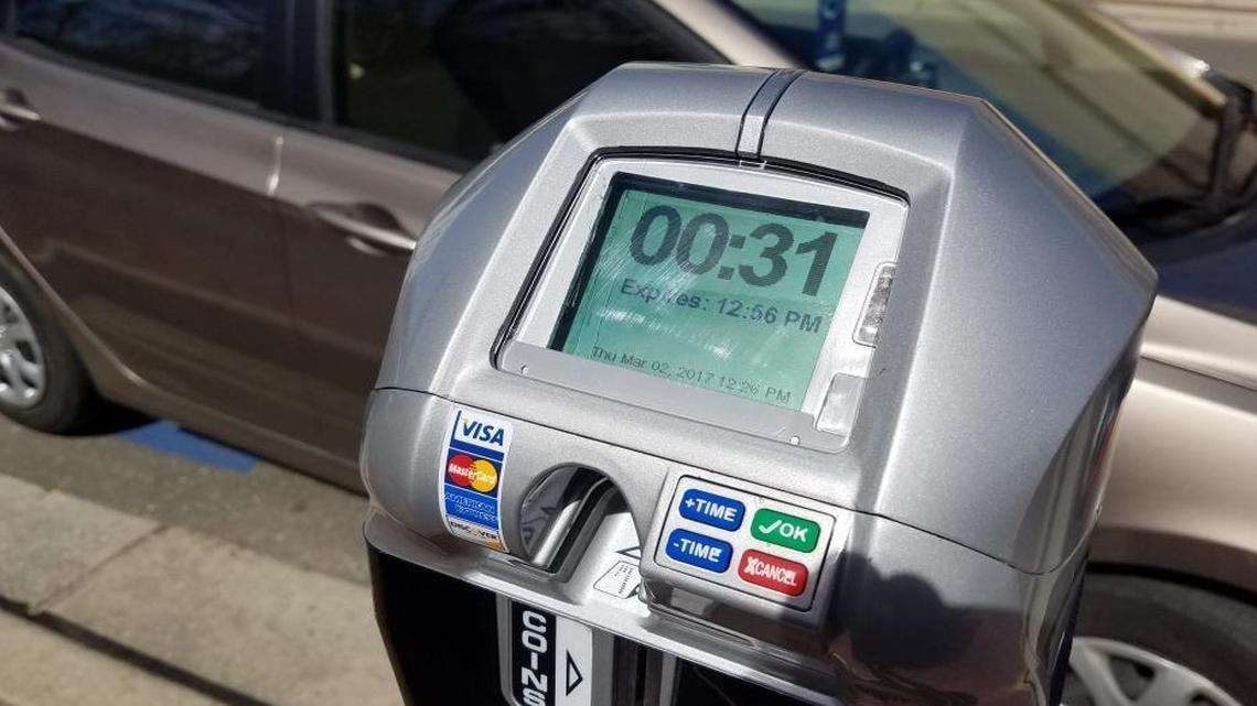 Durham removes some downtown parking meters, extends others