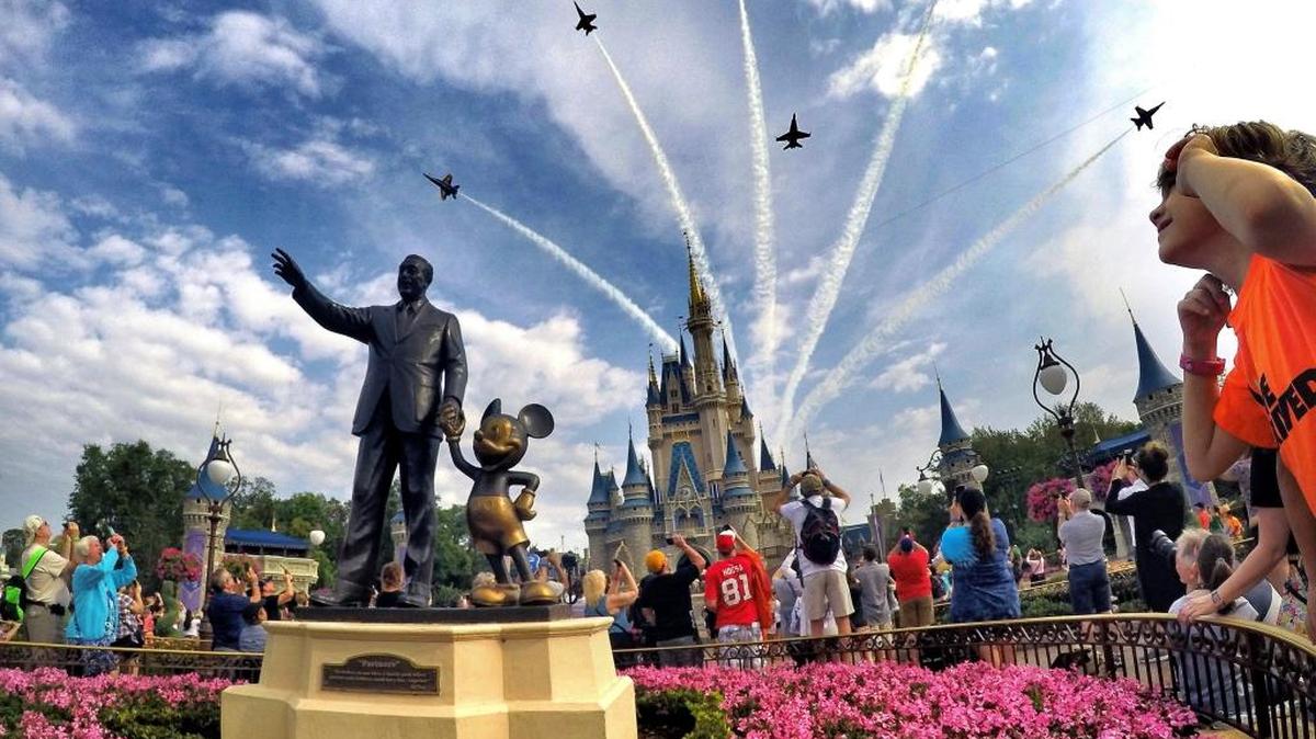 Scenes from the Cinderella Castle and the ‘Partners’ statue at the Magic Kingdom at Walt Disney World, in Bay Lake, Fla., Thursday, April 6, 2017. The owner of the State Farmer’s Market Restaurant in Raleigh paid for her entire staff to travel to Disney World in Orlando.