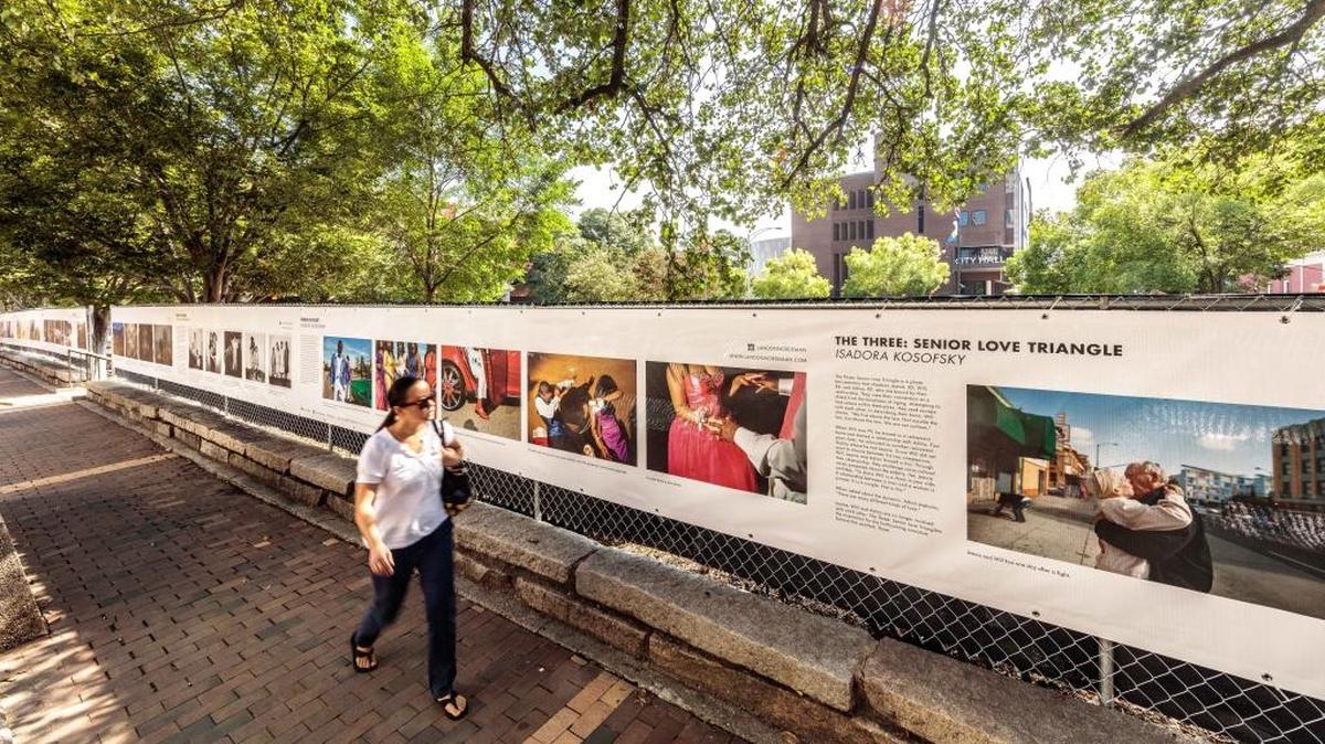 ‘The Fence,’ a traveling photography exhibit, is on view through November across from Durham’s City Hall.
