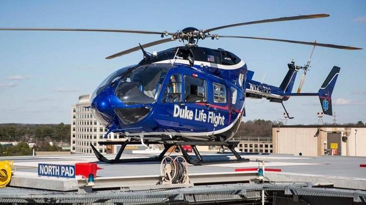 A Duke Health System Life Flight helicopter is pictured on the landing pad on top of Duke Hospital in this Jan. 18 file photo. A similar copter crashed in Perquimans County on Sept. 8, killing all three crew members and a passenger.