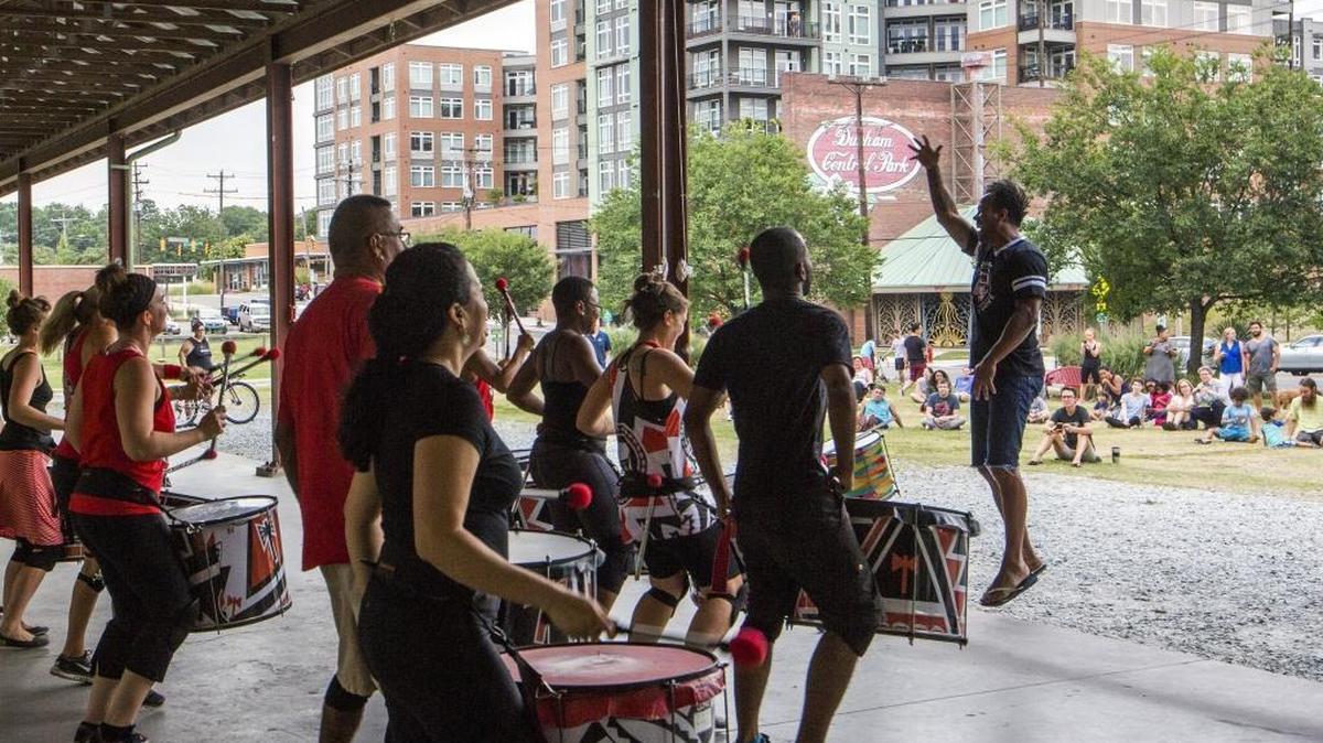 The musical director of Batalá, Caique Vidal, leads a weekly rehearsal at Durham Central Park on Monday, Aug. 7, 2017, in Durham, NC, to an audience of about 100 who came to show their support for the band in response to noise complaints from Liberty Warehouse Apartment residents. Durham City Council will take up the noise ordinance at its Feb. 19 meeting.