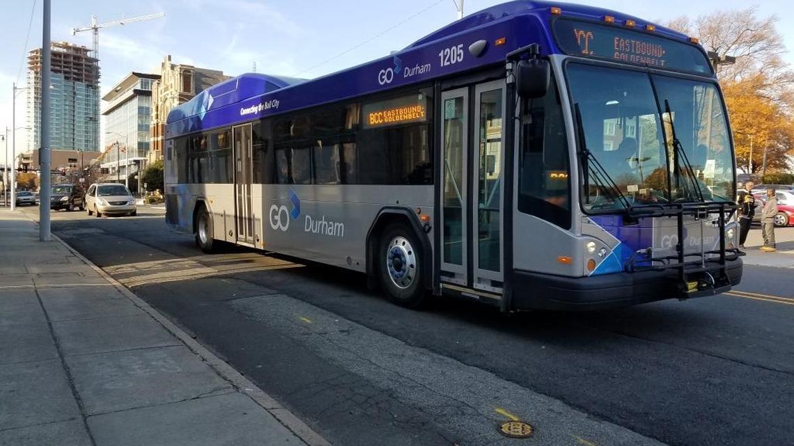 A GoDurham bus passes by along East Main Street in December 2017.