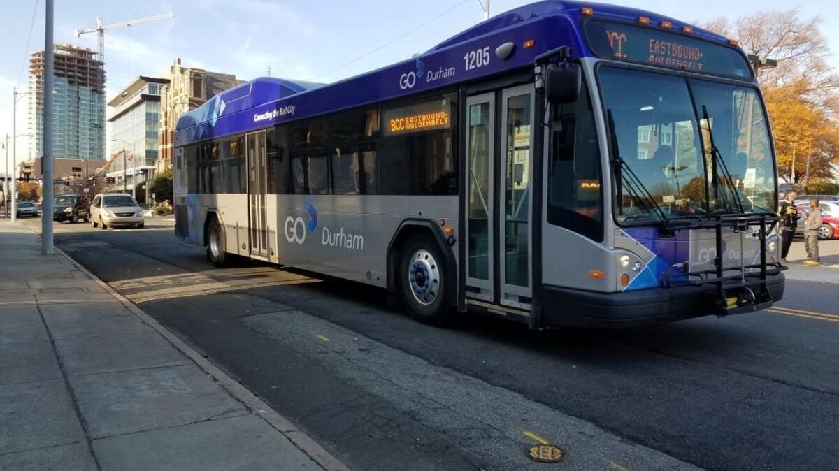 A GoDurham bus passes by along East Main Street in December 2017.