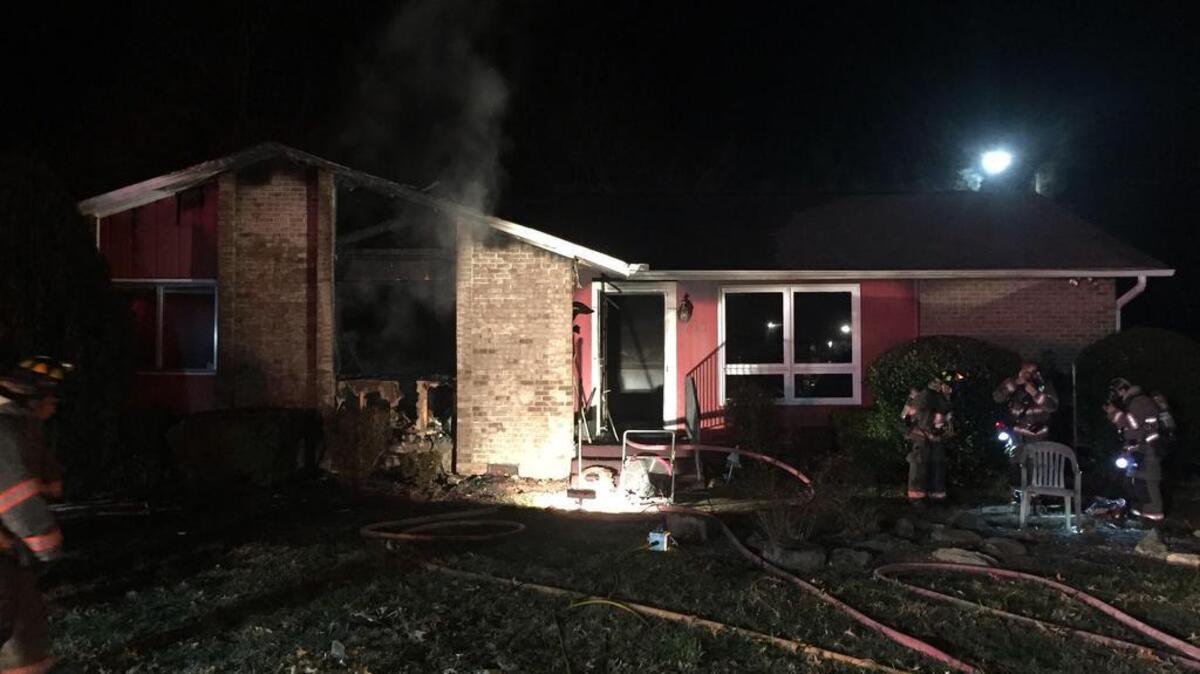 Durham firefighters are pictured at the 711 Rippling Stream Road site of Friday night’s fire.