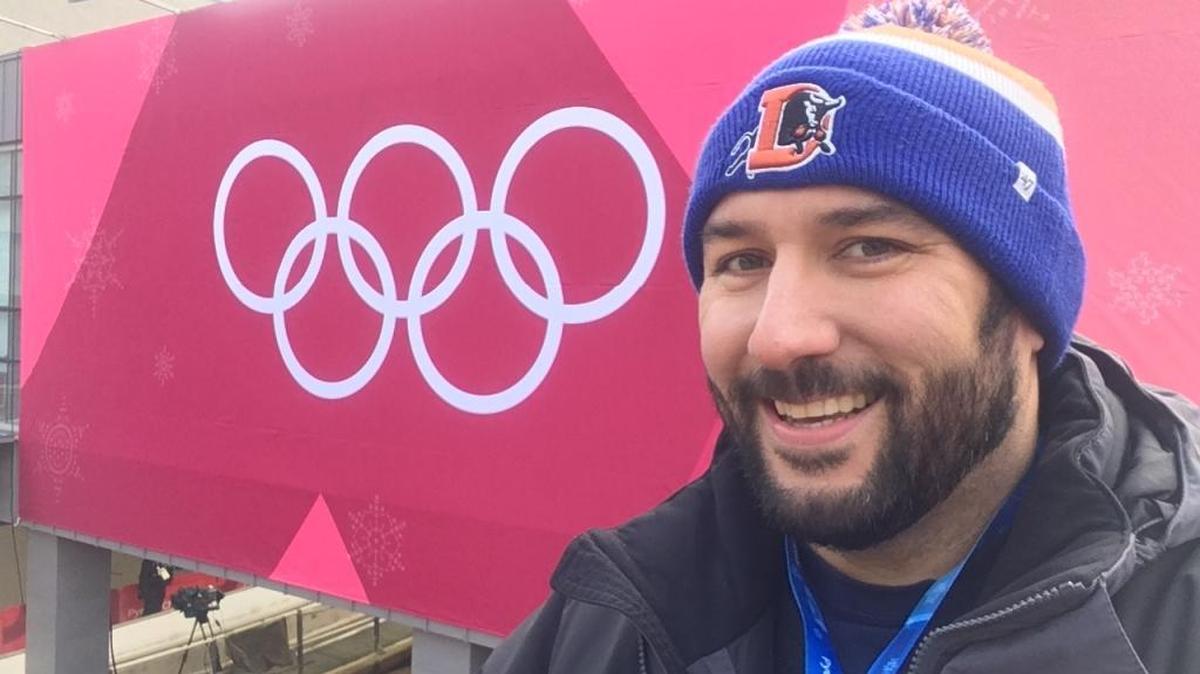 Ken Childs of Durham is in PyeongChang, South Korea covering the bobsled, luge and skeleton events while sporting Durham Bulls headwear complete with the Bulls’ snorting bull logo, during the 2018 Winter Olympics.