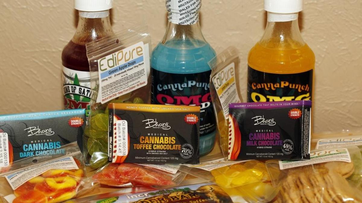 This April 18, 2014, file photo shows edible marijuana products on display at a medical marijuana dispensary in Denver, Colorado. A new RTI International study finds that users of medical and recreational marijuana prefer edible products for many reasons.